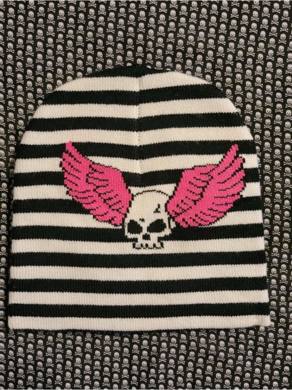 Striped Beanie with Pink Winged Skull